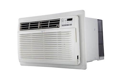 A large white window air conditioner unit.