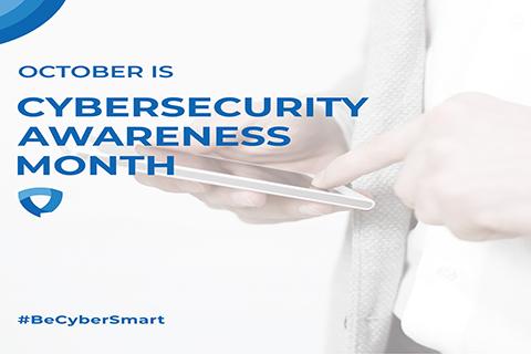 Image of a hand holding a cell phone with the text October is Cybersecurity Awareness Month